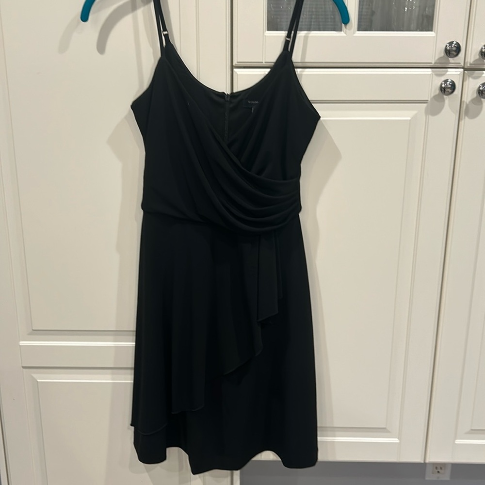 Brand new with tags. Spaghetti strap faux wrap dress